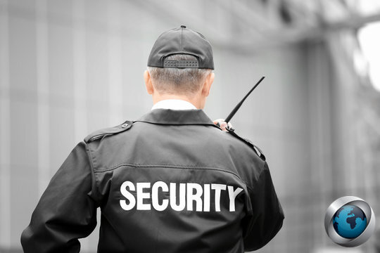 Armed guard providing protective presence at corporate entrance — Providers International